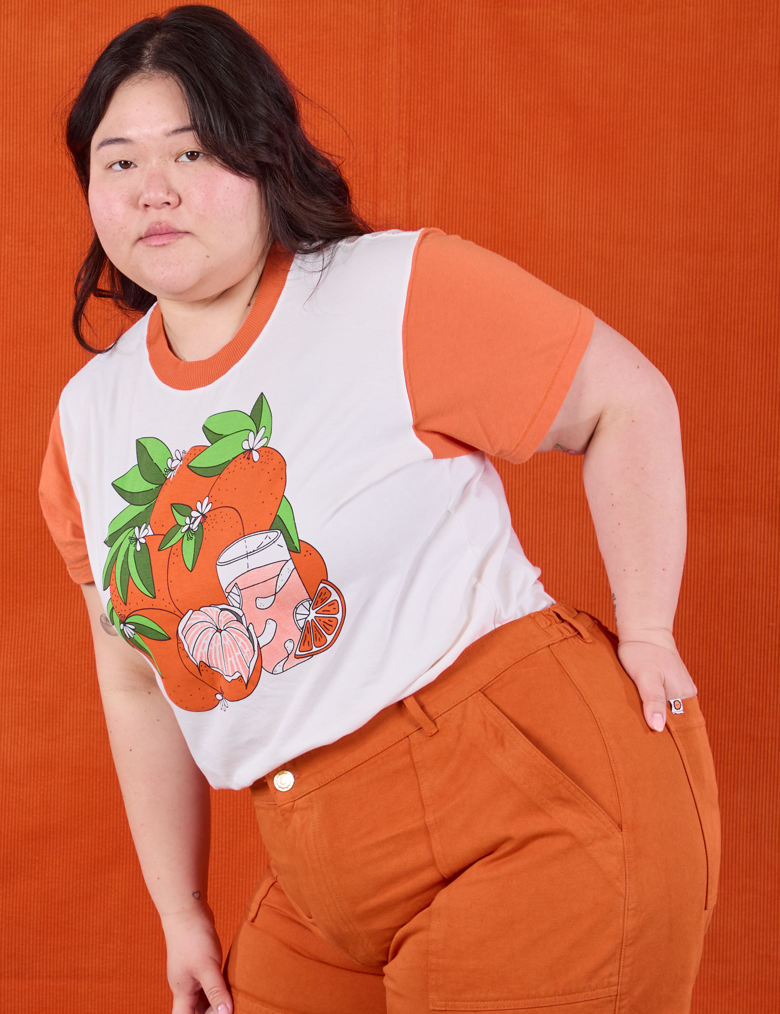 Anniversary Tee in Orange Blossom angled front view on Ashley