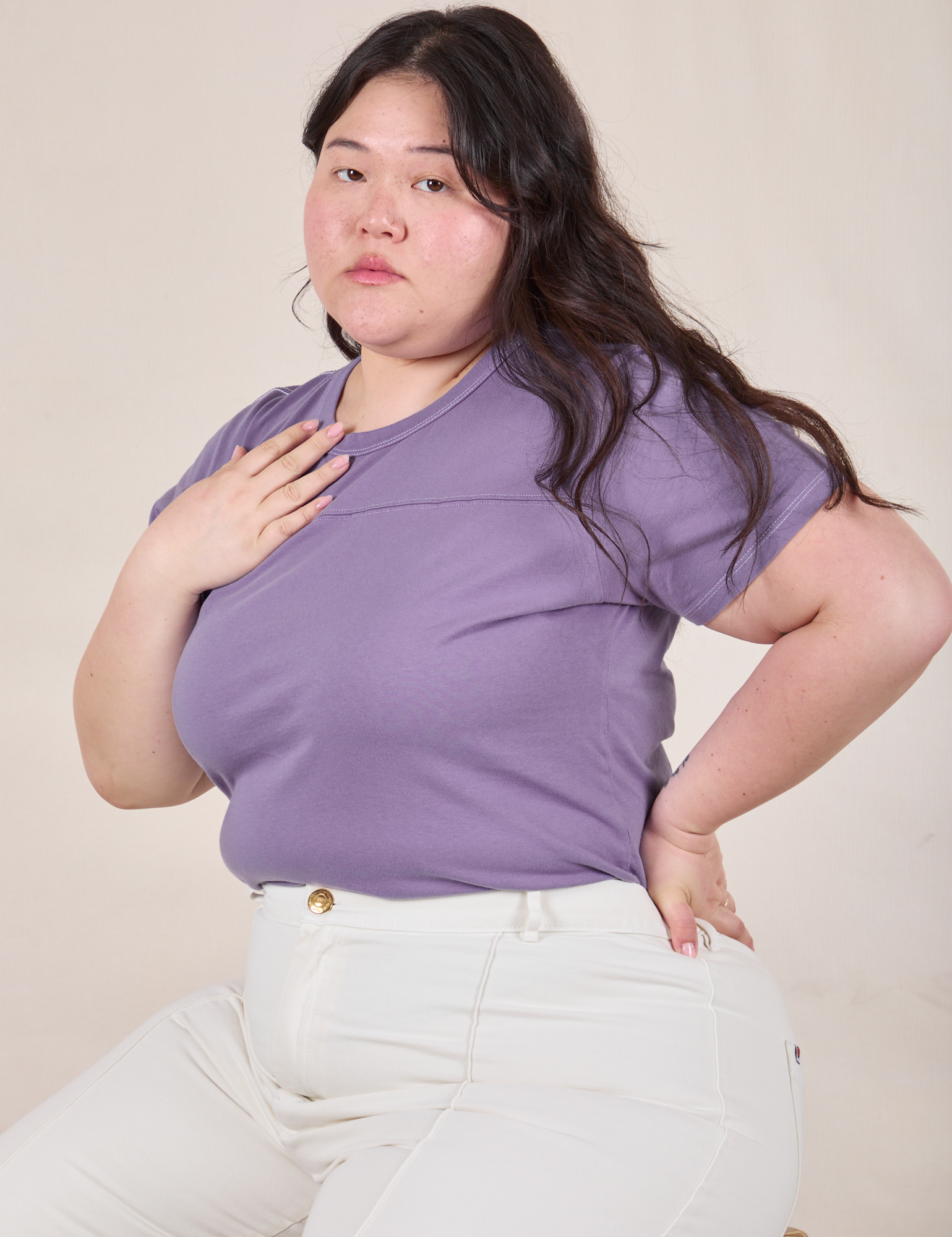 Angled view of Jr. Varsity Tee in Faded Grape on Ashley
