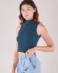 Sleeveless Essential Turtleneck in Lagoon angled front view on Alex