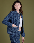 Angled front view of Lazy Daisy Work Jacket on Alex
