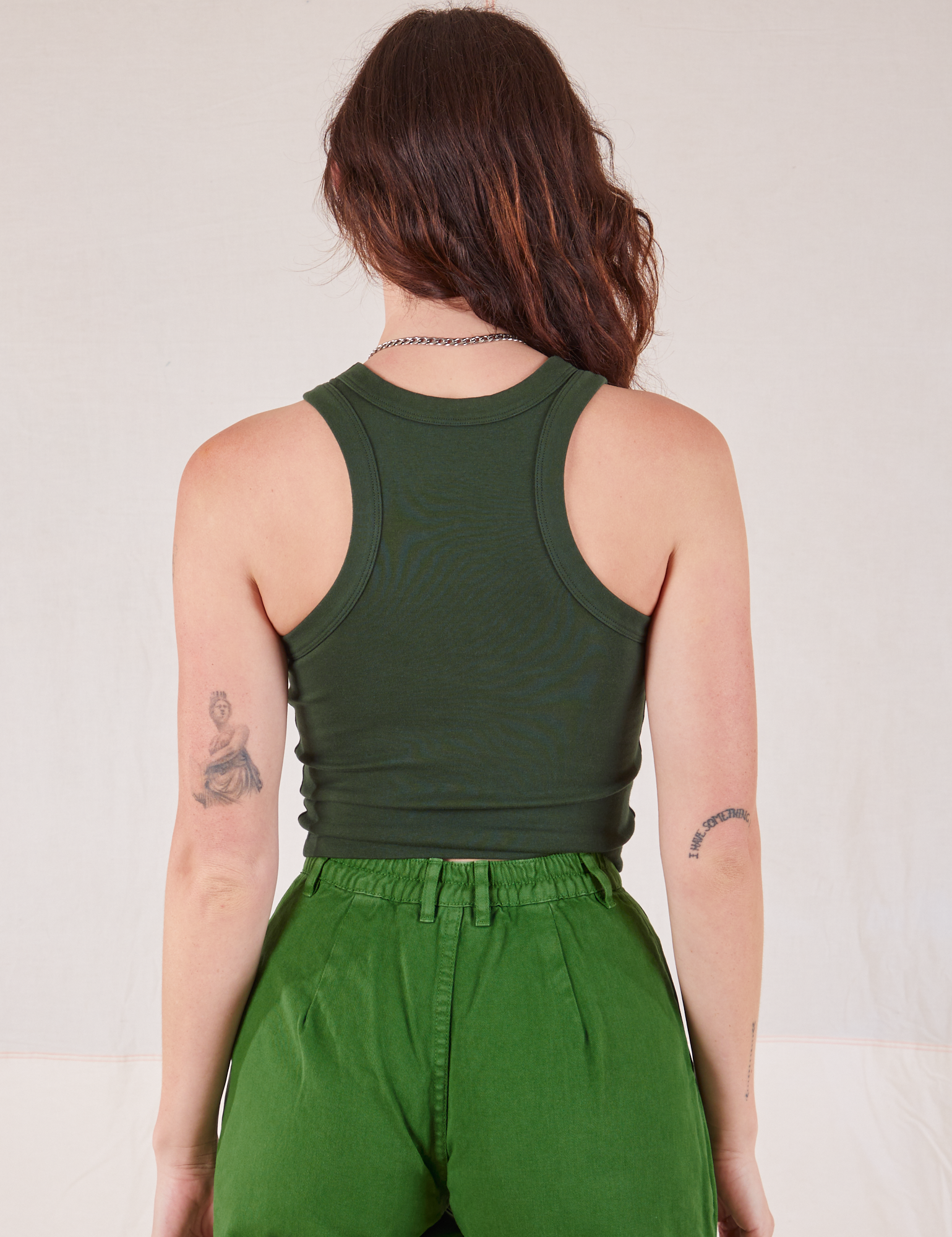 Racerback Tank in Swamp Green back view on Alex