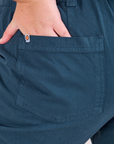 Mid-Rise Work Pants in Lagoon close up of Juliet's hand in the back pocket