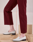 Mid-Rise Work Pants in Red Wine side view pant leg close up on Margaret