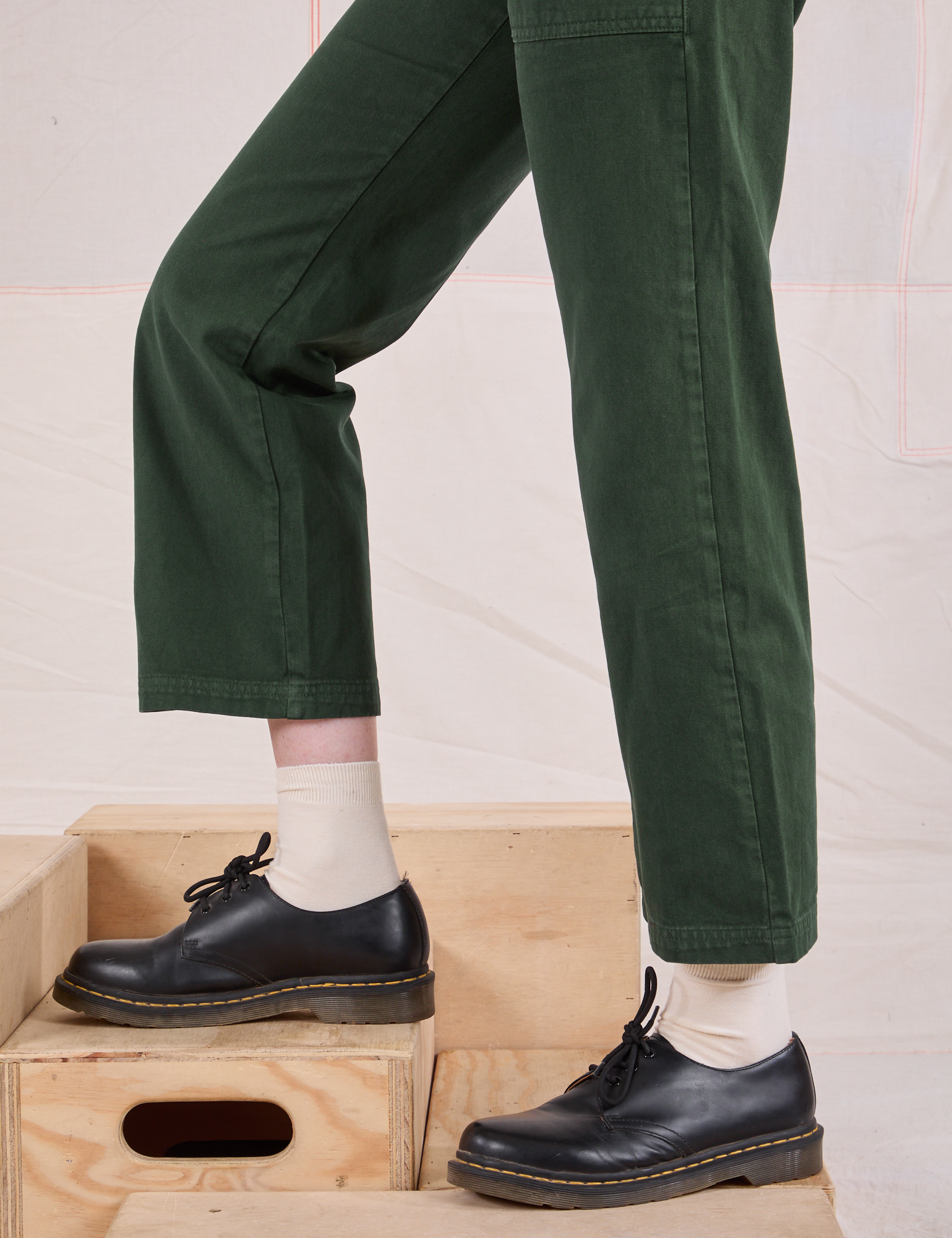 Mid-Rise Work Pants in Swamp Green pant leg close up on Margaret