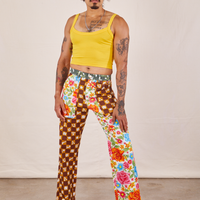 Jesse is 5'8" and wearing XS Mismatched Print Work Pants paired with sunshine yellow Cropped Cami