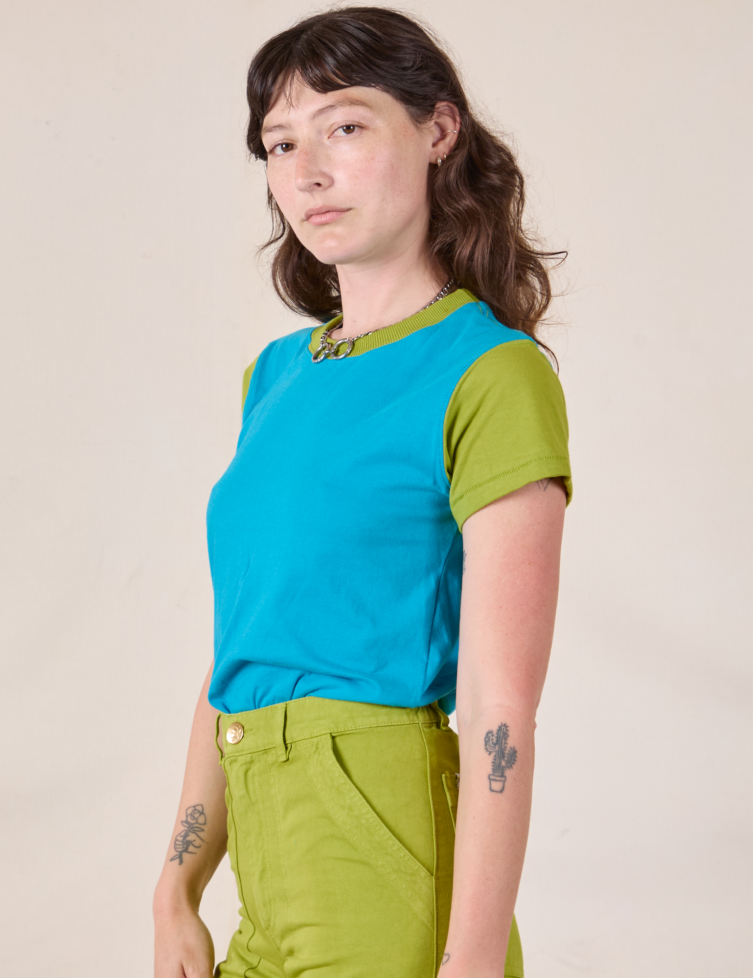 Mismatched Tee in Blue &amp; Green angled front view on Alex