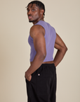 Angled back view of Muscle Tee in Faded Grape on Isaac