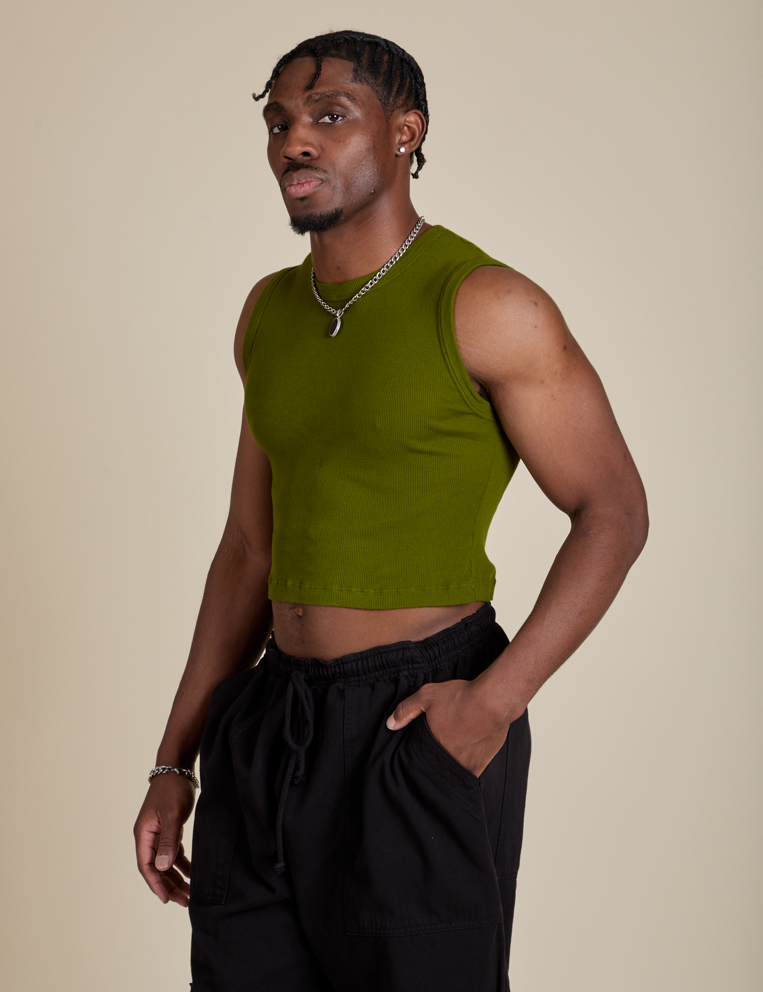 Angled front view of Muscle Tee in Summer Olive on Isaac