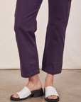 Pant leg close up of Short Sleeve Jumpsuit in Nebula Purple worn by Alex
