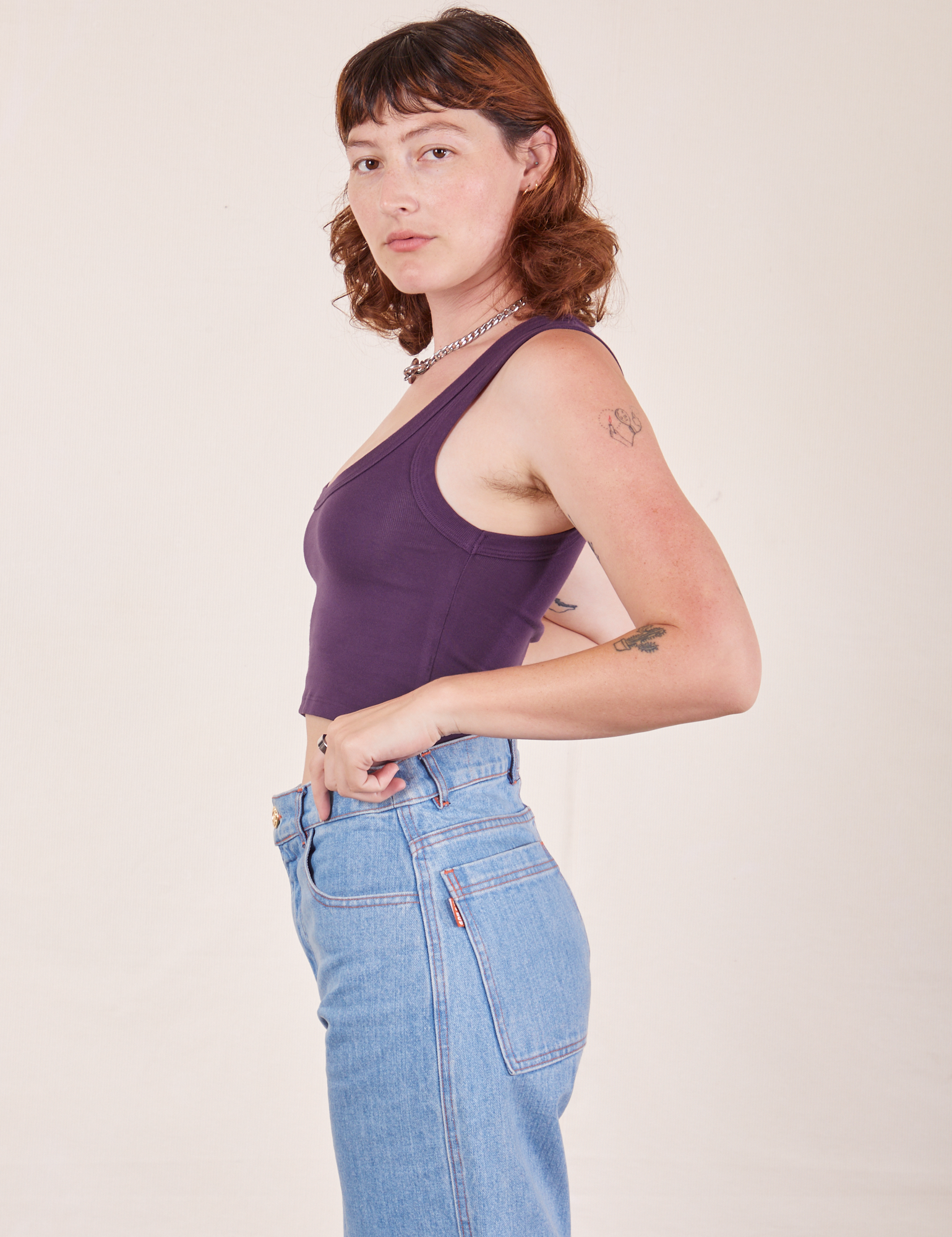 Side view of Cropped Tank Top in Nebula Purple worn by Alex