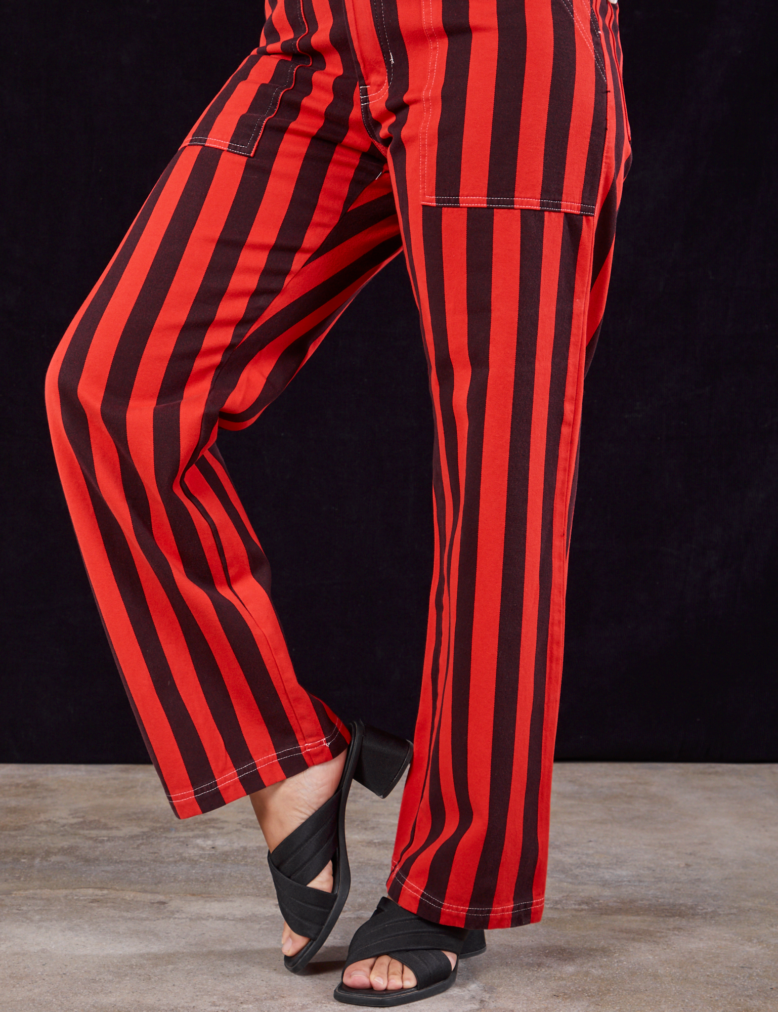 Black Stripe Work Pants in Mustang Red side view closet up on Tiara