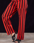 Black Stripe Work Pants in Mustang Red side view closet up on Tiara