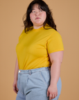 Angled front view of Organic Vintage Tee in Sunshine Yellow on Ashley