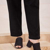 Pant leg close up of Organic Trousers in Basic Black worn by Alex