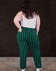 Back view of Black Stripe Work Pants in Hunter and vintage off-white Cropped Tank Top on Ashley