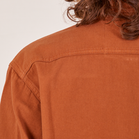 Back shoulder close up of Oversize Overshirt in Burnt Terracotta on Alex