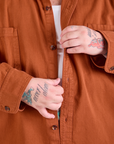 Twill Overshirt in Burnt Terracotta front close up on Sam