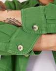 Sleeve close up of Oversize Overshirt in Lawn Green worn by Jesse
