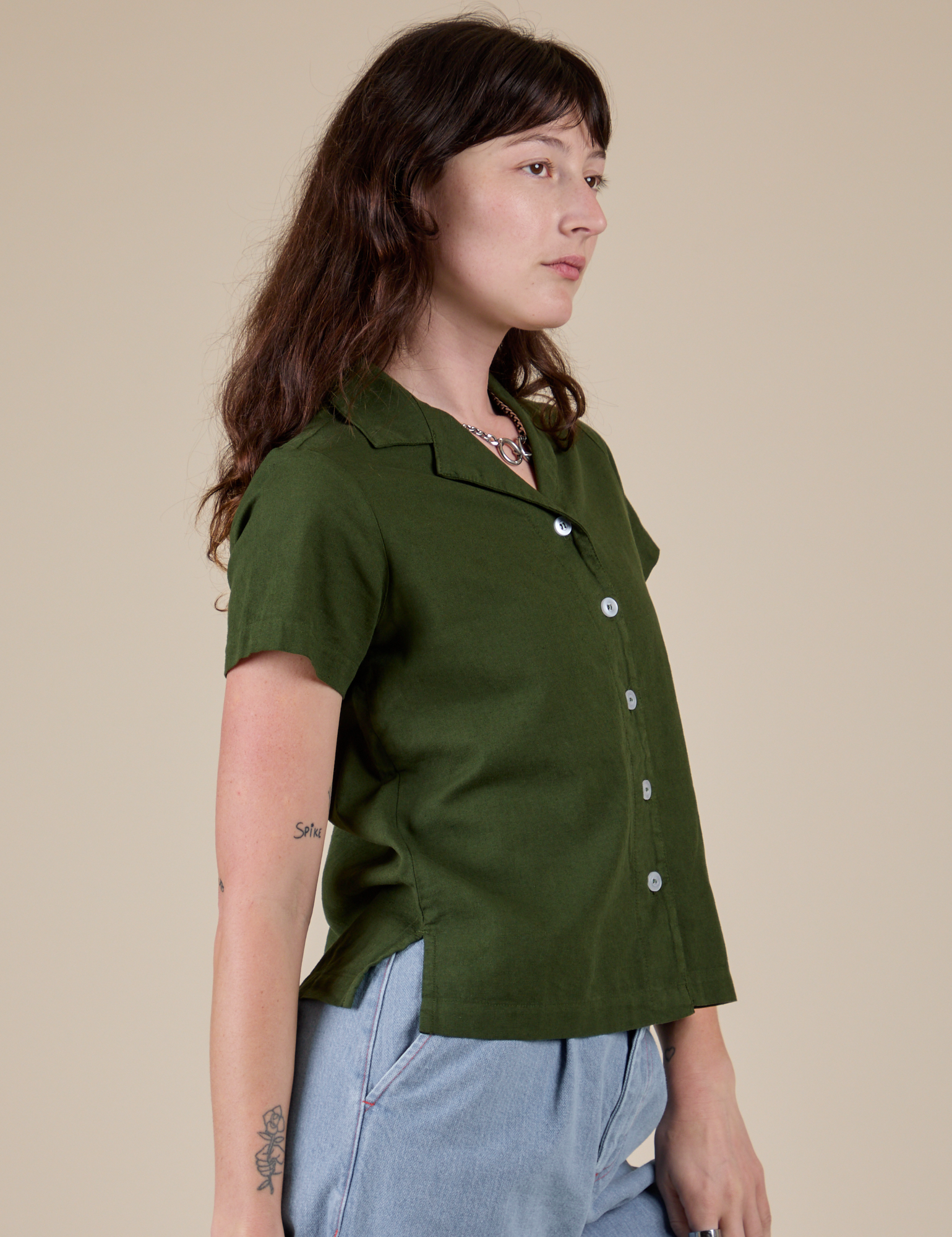Pantry Button-Up in Evergreen angled front view on Alex
