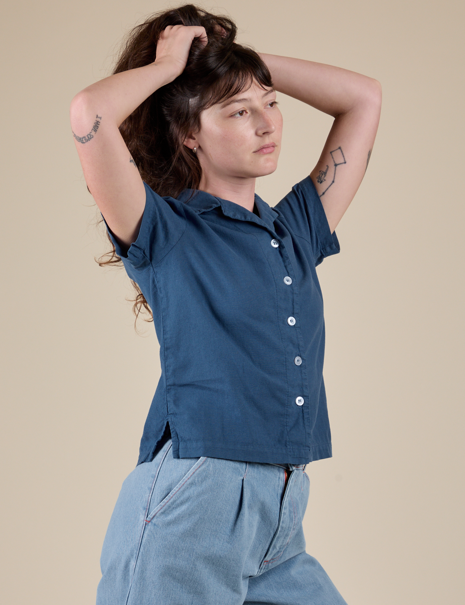 Angled front view of Pantry Button-Up in French Blue on Alex
