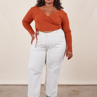 Morgan is 5'5" and wearing Petite 1XL Work Pants in Vintage Off-White paired with burnt terracotta Wrap Top