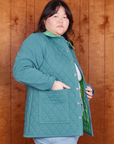 Side view of Quilted Overcoat in Marine Blue on Ashley