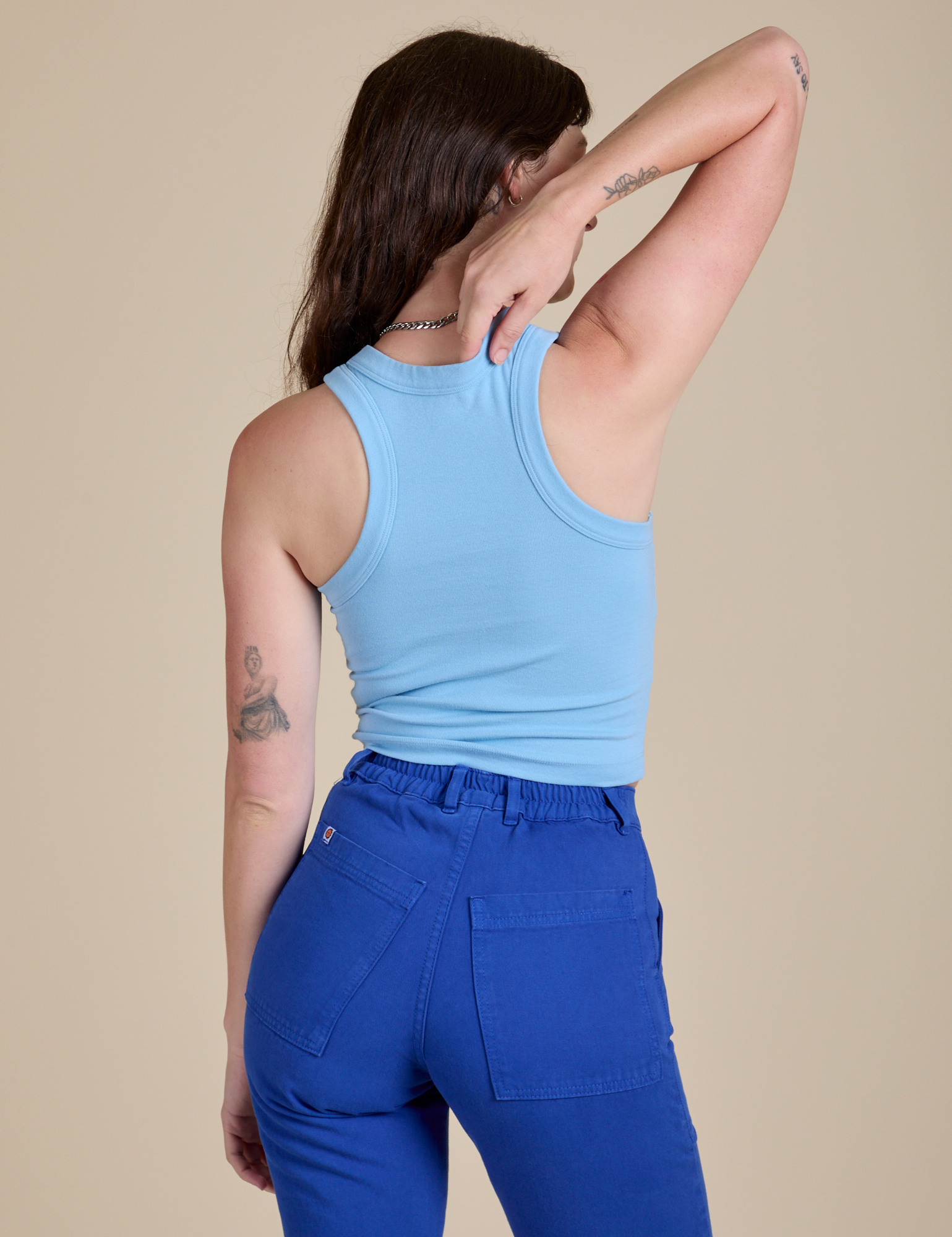Racerback Tank in Baby Blue back view on Alex