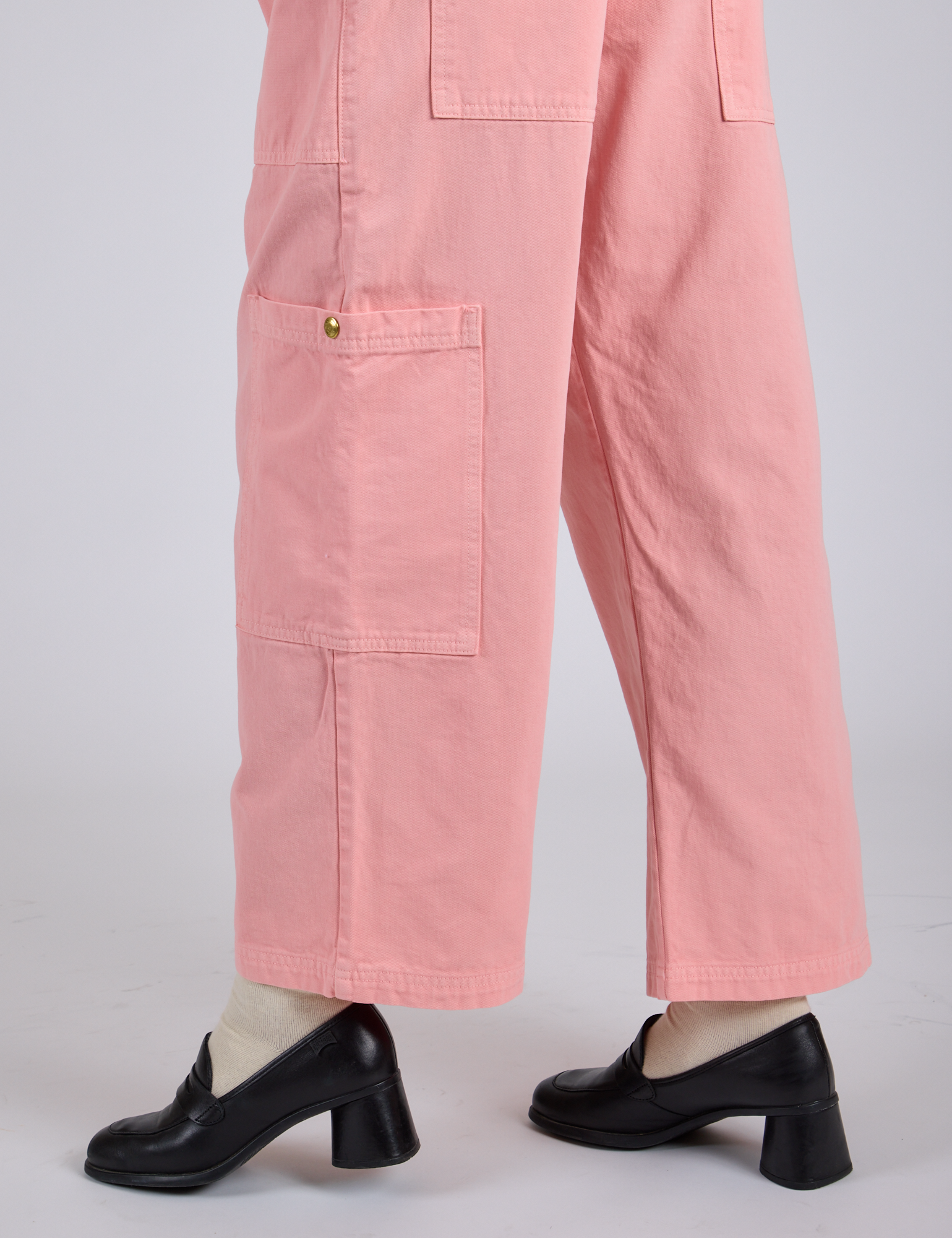 Close up of Drop Pocket Cargo Pants in Baby Pink pant legs on Kira