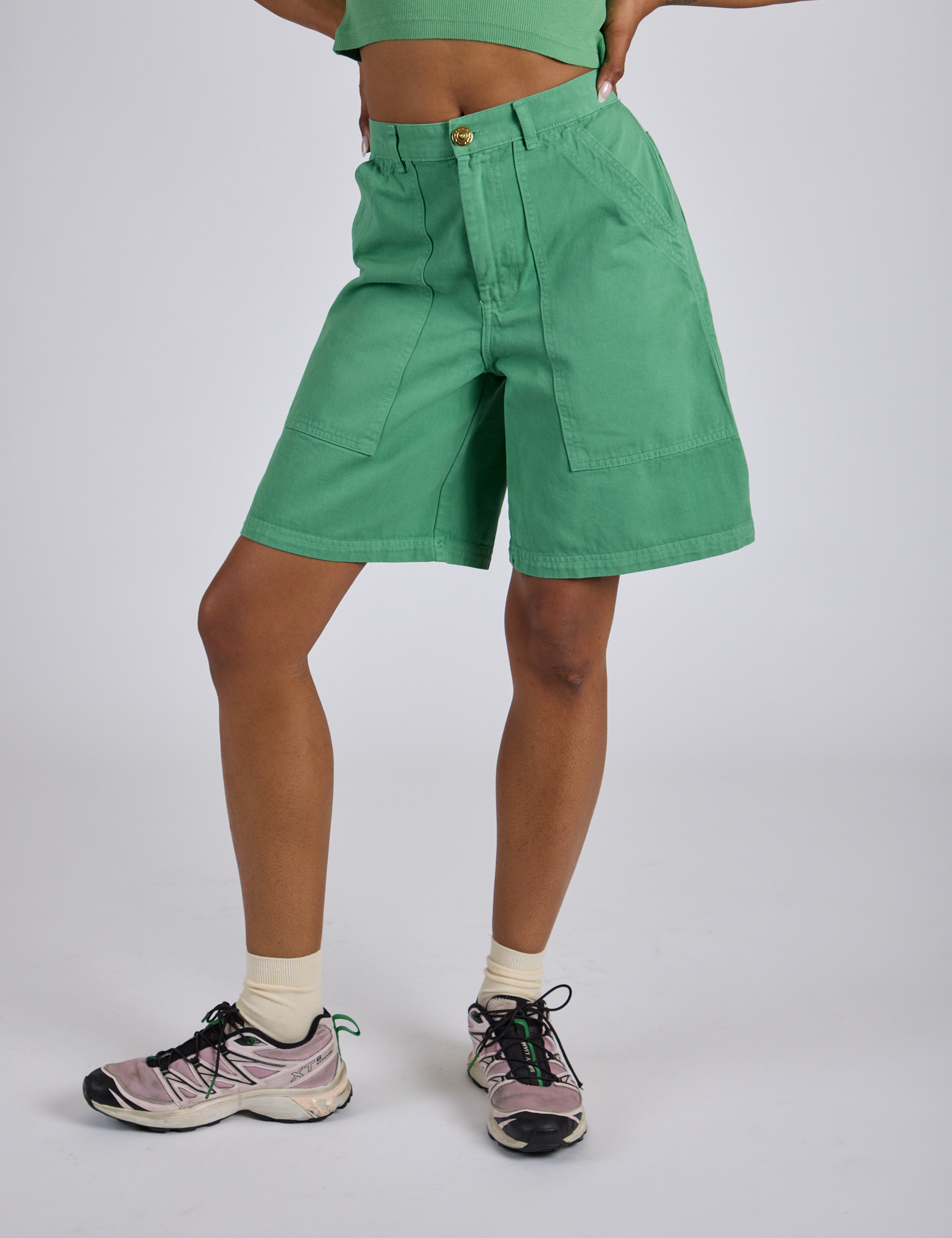 Longline Work Shorts in Seafoam Green close up on Kira