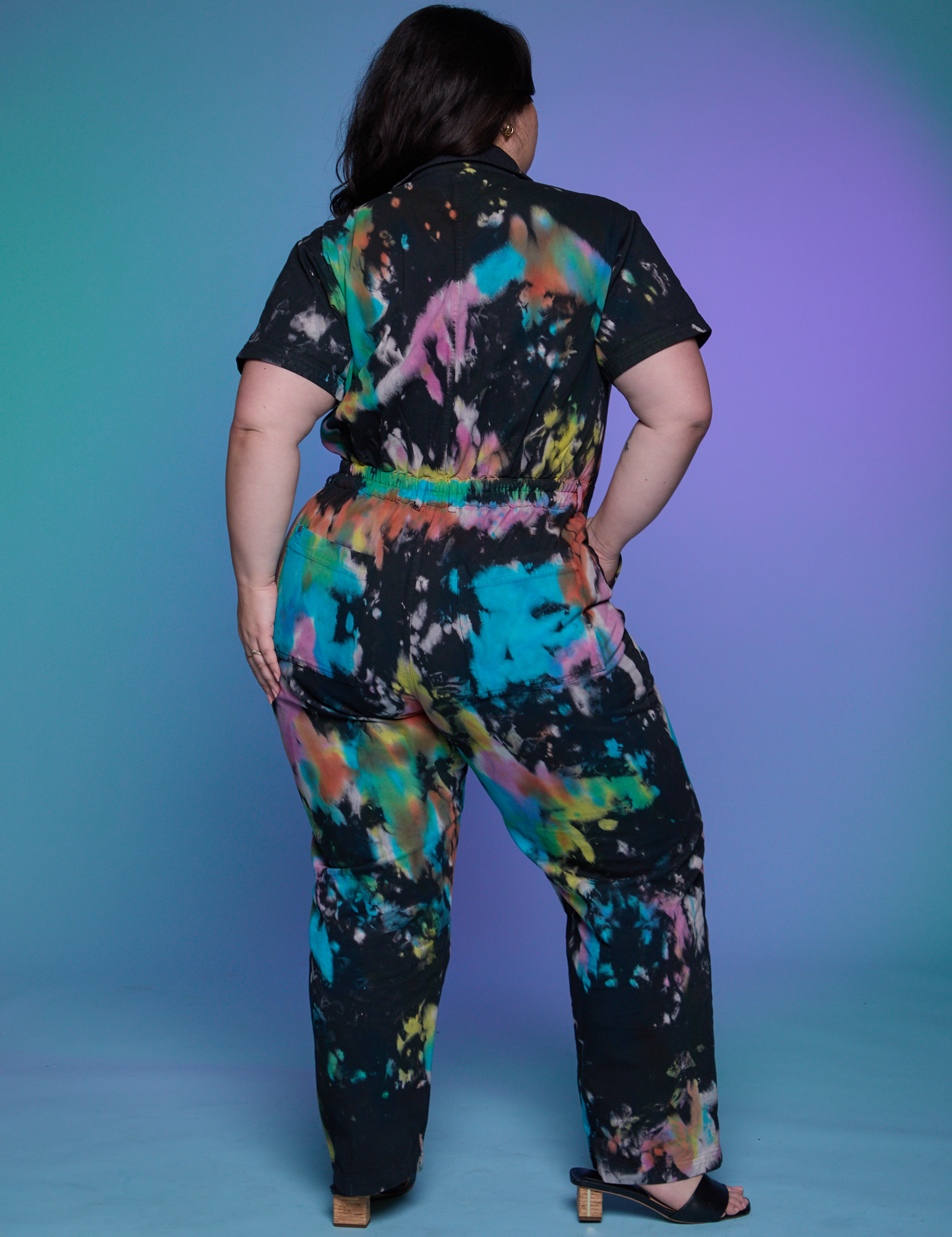 Short Sleeve Jumpsuit in Rainbow Magic Waters back view on Ashley