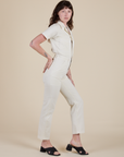 Short Sleeve Jumpsuit in Vintage Tee White side view on Alex