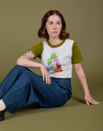 Hana is wearing Olive Lottie Tee