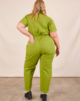 Short Sleeve Jumpsuit in Gross Green back view on Juliet