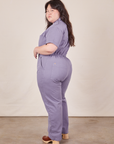 Side view of Short Sleeve Jumpsuit in Faded Grape worn by Ashley