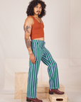 Side view of Stripe Work Pants in Green and burnt terracotta Cropped Tank
