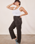 Side view of Black Striped Work Pants in Espresso and vintage off-white Tank Top on Tiara