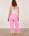 Back view of Cropped Rolled Cuff Sweatpants in Bubblegum Pink and vintage off-white Cami on Alex