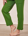 Cropped Rolled Cuff Sweatpants in Lawn Green pant leg close up on Alex