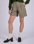 Pleated Trouser Shorts in Khaki Grey close up on Alex