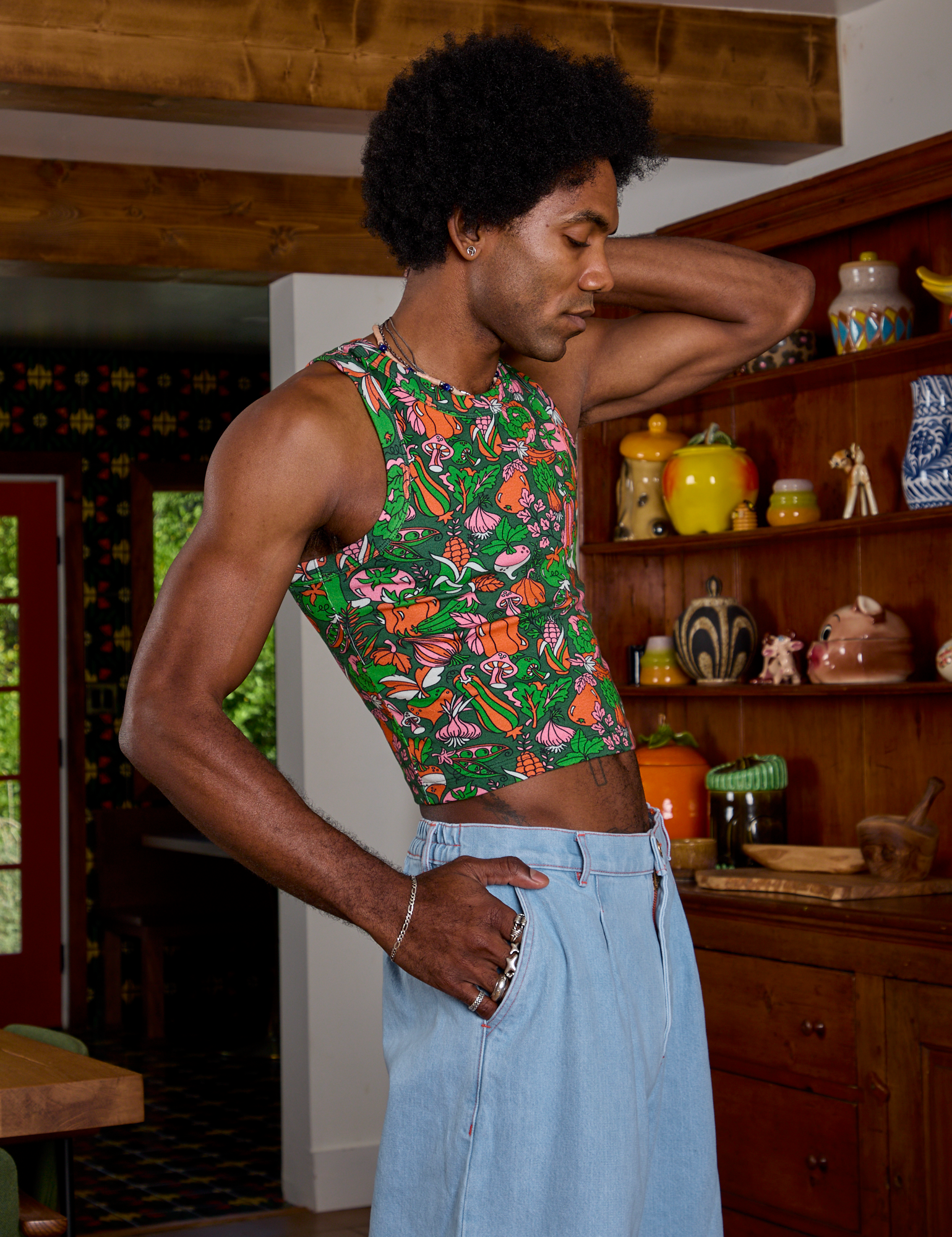 Kitchen Collection Racerback Tank side view on Jerrod