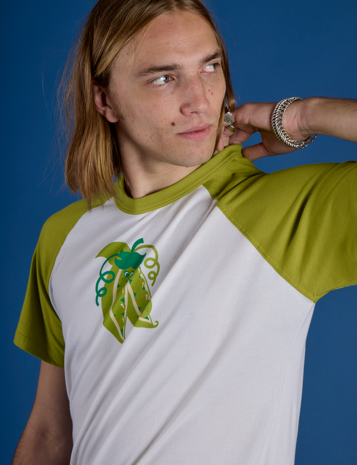 Front close up of Produce Raglan Tee in Snap Peas on Grant