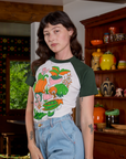 Angled front view of Short Sleeve Raglan Tee in Veggies on Alex