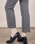 Short Sleeve Jumpsuit in Washed Grey pant leg close up on Alex