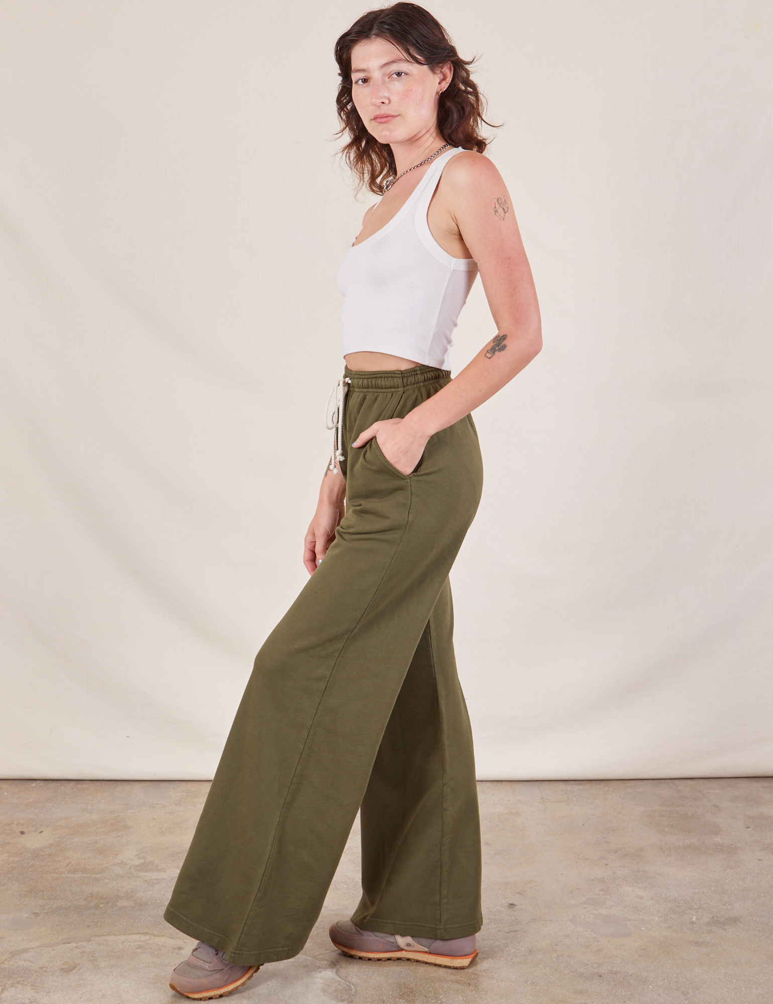 Wide Leg Sweat Pants in Surplus Green side view on Alex