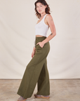 Wide Leg Sweat Pants in Surplus Green side view on Alex