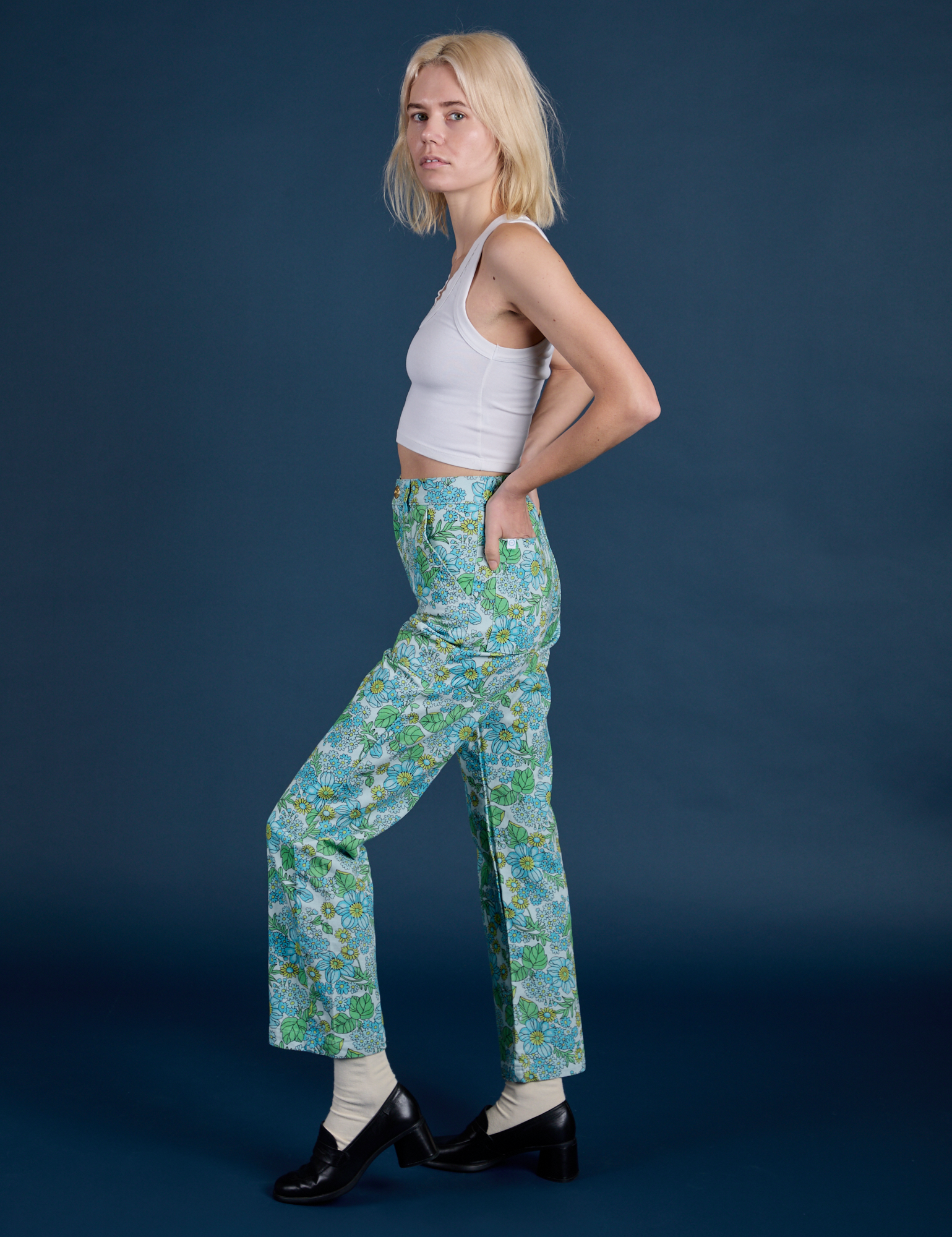 Side view of Winter Floral Print Work Pants and Cropped Tank in Vintage Tee White on Madeline