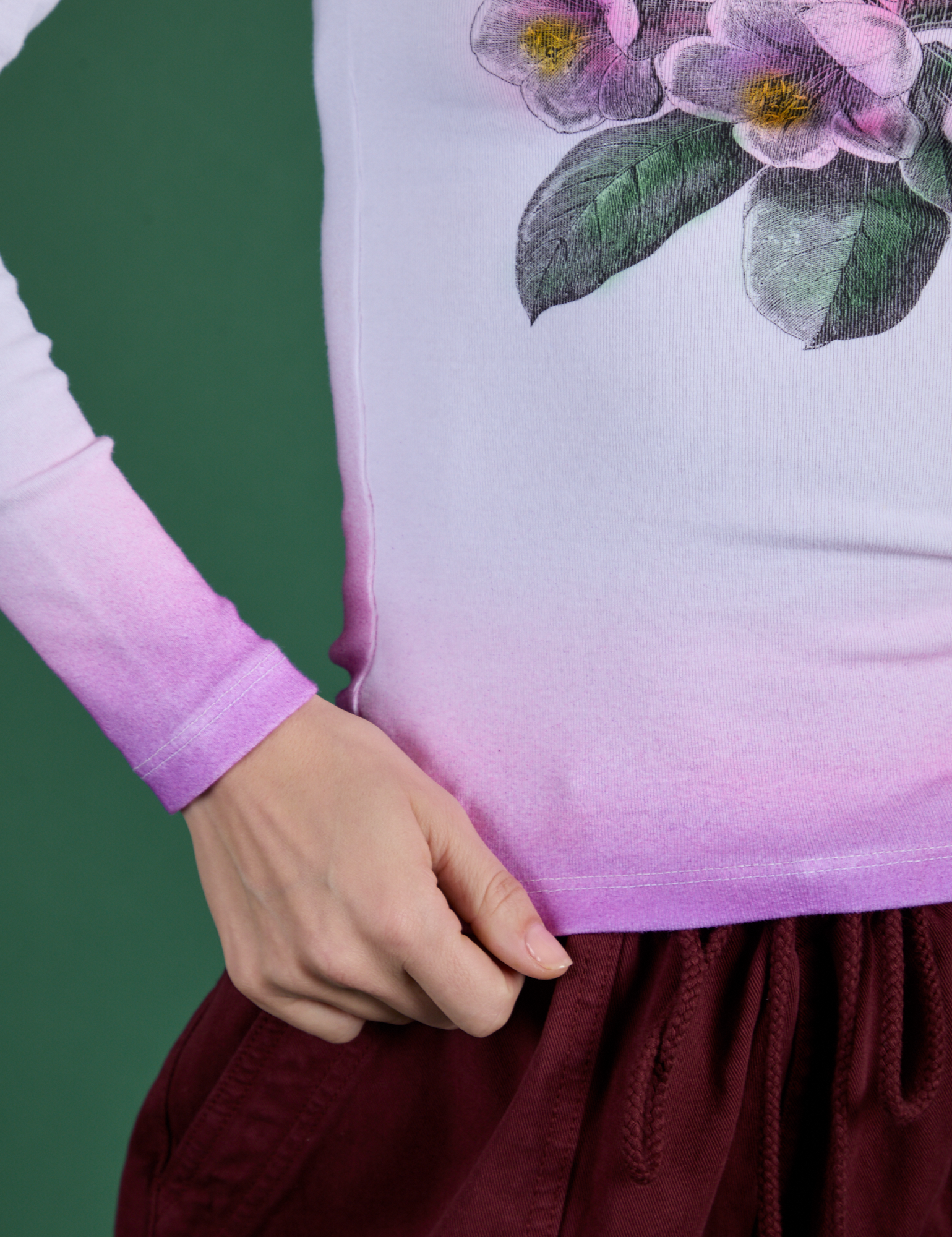 Floral Long Sleeve Baby Tee in Pink bottom close up on Madeline