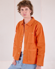 Denim Work Jacket in Construction Orange angled front view on Quinn