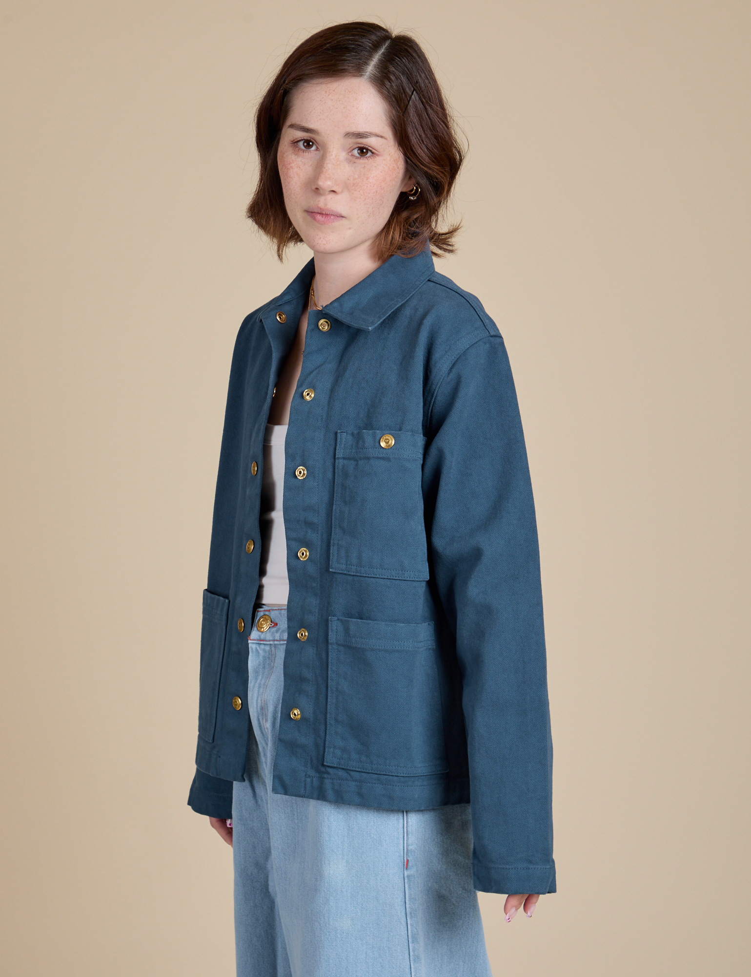Angled front view of Denim Work Jacket in French Blue on Hana