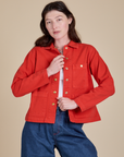 Denim Work Jacket in Mustang Red worn by Alex